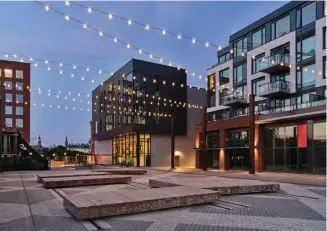  ?? ?? An Ottawa Heritage Award went to the Beater Building, on the former E.B. Eddy site, which was restored by a group led by Hobin Architectu­re. The exterior now mixes red brick from the 1900s with black metal siding and glass