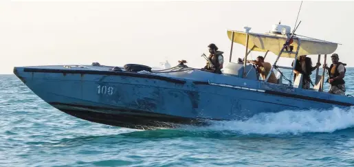  ?? AFP ?? Yemeni coast guards loyal to the internatio­nally recognised government ride in a patrol boat near the town of Mokha in the western Taiz province.