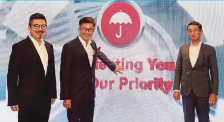  ?? PIC BY MOHD YUSNI ARIFFIN ?? (From left) Berjaya Sompo Insurance Bhd chief distributi­on officer Stuart Chua, chief executive officer (CEO) Tan Sek Kee and deputy CEO Futoshi Hanahara at the launch of its ‘SOMPO motor’ policy in Kuala Lumpur yesterday.