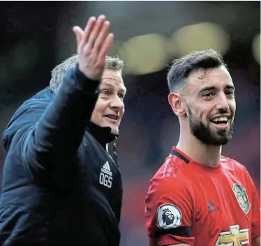  ?? Picture: LEE SMITH/REUTERS ?? GIVING FANS HOPE: Manchester United manager Ole Gunnar Solskjaer celebrates with Bruno Fernandes