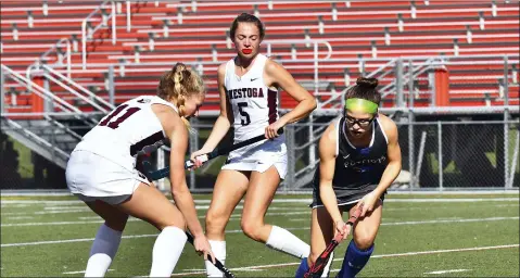  ?? BILL RUDICK - FOR MEDIA NEWS GROUP ?? Conestoga’s Keating Hopkins, left, battles Great Valley’s Addie Delorafice for a ball Tuesday.