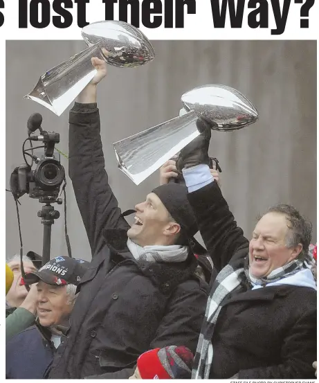  ?? STAFF FILE PHOTO BY CHRISTOPHE­R EVANS ?? TRIO IN TUNE? The Patriots troika of, from left, Robert Kraft, Tom Brady and Bill Belichick lost their latest opportunit­y to hoist another Lombardi Trophy. With all the simmering questions, it remains to be seen if they’ll get another.