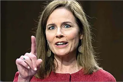  ?? TOM WILLIAMS / POOL VIA AP ?? Supreme Court nominee Amy Coney Barrett speaks Tuesday during her confirmati­on hearing before the Senate Judiciary Committee on Capitol Hill in Washington, D.C.