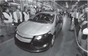  ?? AP PHOTO/CARLOS OSORIO ?? Then-Michigan Gov. Jennifer Granholm drives a preproduct­ion Chevrolet Volt at the Hamtramck Assembly plant in 2009.