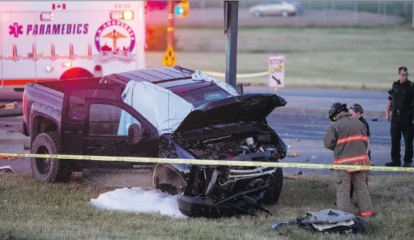  ?? LIAM RICHARDS/FILES ?? Saskatoon emergency services respond to an accident on Airport Drive in June 2017 that killed the driver, who was allegedly evading police in a high-speed chase.