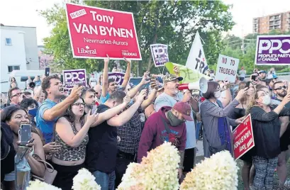  ?? NATHAN DENETTE THE CANADIAN PRESS FILE PHOTO ?? People’s Party of Canada supporters jeer Liberal Leader Justin Trudeau at an event in Newmarket this month. The tone of such protests has been echoed in social media posts by party leader Maxime Bernier, who has called Trudeau a “fascist psychopath.”