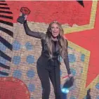  ?? BRIANA SANCHEZ/AUSTIN AMERICAN-STATESMAN ?? Carly Pearce accepts the award for Collaborat­ive Video of the Year at the 2024 CMT Music Awards at the Moody Center in Austin, Texas, on Sunday night.