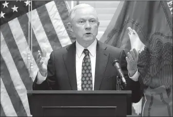  ?? The Associated Press/JOHN LOCHER ?? Attorney General Jeff Sessions speaks to federal, state and local law enforcemen­t officials in July about efforts to combat violent crime in Las Vegas. Sessions and other top Trump administra­tion officials — when in town — attend weekly Bible study...