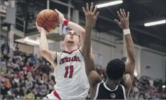  ?? Erin reid Coker / Special to the times union ?? Battling a left ankle injury, Joseph Girard iii showed the will to keep playing and led Glens falls to both state public high school and federation championsh­ips in march.