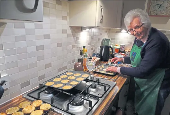  ?? ?? ANNUAL TREATS: The Doyenne at work on the first batch of her mince pies, most of which will be given out as presents.