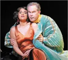  ?? - ap ?? Soprano amina edris, left, and bass-baritone Gerald Finley as the title characters in an early rehearsal of John adams’ “antony and Cleopatra,” which is showing at the San Francisco Opera.