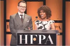  ??  ?? Christian Slater and Alfre Woodard speak onstage during the Hollywood Foreign Press Associatio­n’s Grants Banquet at The Beverly Hilton Hotel on Thursday in Beverly Hills, California. — AFP photo