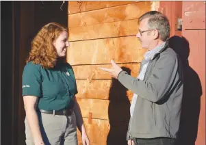  ?? THE GUARDIAN FILE PHOTO ?? Chantelle MacDonald, project co-ordinator with Parks Canada, and Arnold Smith, former tourist operator in Cavendish, discuss changes coming to Green Gables Heritage Site in Cavendish.