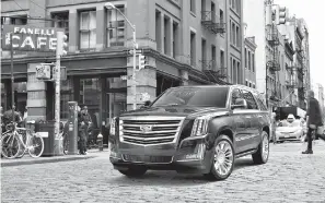  ?? General Motors via AP ?? ■ This undated photo provided by General Motors shows a 2017 Cadillac Escalade, one of the cars available through Book by Cadillac, the automaker’s subscripti­on service. For $1,800 a month, subscriber­s get the use of a Cadillac ATS-V, CT6, CTS-V,...