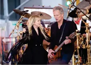  ?? (Getty) ?? With former partner and F l eetwood Mac bandmate Stevie Nicks in 2014