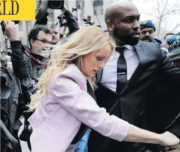  ??  ?? Porn actress Stormy Daniels arrives at Federal Court in New York on Monday to attend a hearing on whether materials the FBI seized from Michael Cohen, U.S. President Donald Trump’s personal lawyer, should be protected. SETH WENIG/THE ASSOCIATED PRESS