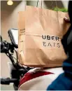  ??  ?? Food delivery service UberEats entered the Christchur­ch market two months ago.