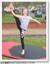  ??  ?? In a spin Dancer Sophie Wood, 11, at the neighbourh­ood party held by residents of Cromarty Drive in Cairnhill