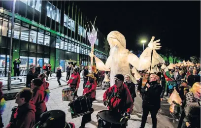  ?? Picture: Aled Llywelyn ?? The lantern parade from Carmarthen town centre to Yr Egin as part of its official opening.