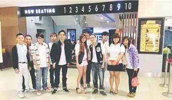  ??  ?? MOVIE NIGHT: Students pose in front of the cinema hall before enjoying the premiere movie.