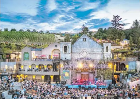  ?? Mountain Winery ?? MUSIC FANS gather for an alfresco concert at the Mountain Winery stage and dining complex in the hills above Saratoga, Calif.