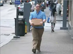  ?? Eric Chapman ?? Craig (played by Garrett Titlebaum) walks down the street after quitting his job in “Craig Quits His Day Job” on Amazon Prime.