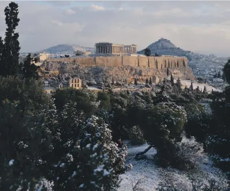  ?? AP ?? Students have the opportunit­y to visit Athens and research how the city is coping with economic and social problems