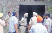  ?? HT PHOTO ?? Police personnel examining the house where three women were found murdered at the Makhowal village on Thursday.