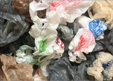  ?? LAUREN HALLIGAN — MEDIANEWS GROUP ?? Some New Yorkers have closets full of plastic bags they’ve collected over the years.