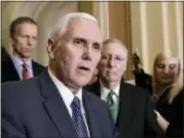  ?? J. SCOTT APPLEWHITE — THE ASSOCIATED PRESS ?? Vice President Mike Pence joins the Senate GOP leadership as Republican­s introduce their plan to repeal and replace the Affordable Care Act on Tuesday on Capitol Hill.
