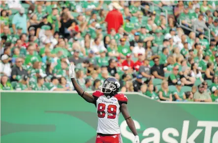  ?? PHOTOS: MARK TAYLOR/THE CANADIAN PRESS ?? Calgary’s DaVaris Daniels waves to Riders fans after scoring a touchdown during Saturday’s game.