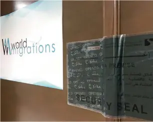  ??  ?? Sealed door of World Migrations office at a building in Business Bay, Dubai. The DED closed the firm after receiving complaints from its customers about the company’s fraud.