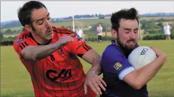  ??  ?? Mattock’s Dan Bannon closes in onSt Mary’s Brendan Matthews during Sunday’s Paddy Sheelan Cup final.