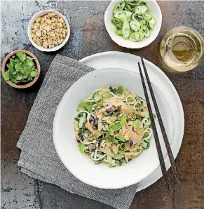  ??  ?? Fish dish garnished with spring onions, coriander and peanuts.