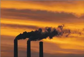  ?? CHARLIE RIEDEL Associated Press ?? THE SUPREME COURT ruling appears to allow the EPA to control smokestack pollution but blocks broader rules to reshape how states produce electricit­y.