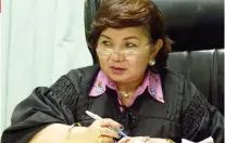  ?? SUNSTAR FILE ?? DEEPER PROBE. Judge Sylva Paderanga is not convinced that security guard Jonathan Sanchez, the suspect in the killing of her husband and son, acted alone when he shot them last Dec. 22, 2016 outside their law office on F. Ramos St. in Cebu City.