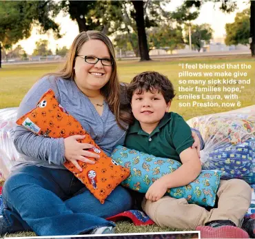  ??  ?? “I feel blessed that the pillows we make give so many sick kids and their families hope,” smiles Laura, with son Preston, now 6