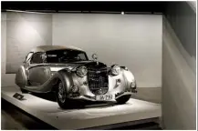  ?? Los Angeles Times/TNS/MYUNG J. CHUN ?? At the Petersen Automotive Museum in Los Angeles you can see the Winged Warrior (top photo), as seen in Batman (1989) and Batman Returns (1992), which is part of a Hollywood-theme exhibit; a 1939 Delahaye Type 165 is displayed (left) and a 1937 Horch 857 Sport Cabriolet (right).