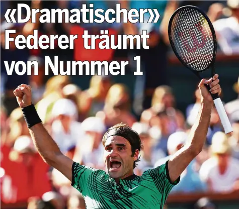  ?? GETTY IMAGES ?? Daran müssen sich die Gegner wieder gewöhnen: Roger Federer reisst nach seinem grossen Turniersie­g die Arme hoch.