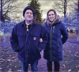  ?? Photo by Theresa Auriemmo ?? Pictured are Bill Cecchetti (left) and Kim Cecchetti (right) at Evergreen Park after the lighting.