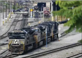  ?? GENE J. PUSKAR — THE ASSOCIATED PRESS ?? Norfolk Southern freight locomotive­s are moved at a terminal in Conway, Pa. Healthy consumer spending and strong exports drove third-quarter U.S. economic growth.