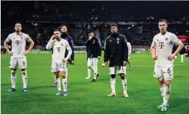  ?? ?? (From left) Harry Kane, Raphaël Guerreiro, Kingsley Coman and Joshua Kimmich go to the Bayern fans in disbelief after their 5-1 defeat at Eintracht Frankfurt, their second by that scoreline in four seasons. Photograph: Markus Gilliar/GES Sportfoto/Getty Images
