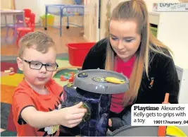  ??  ?? Playtime Alexander Kelly gets to grips with a toy 190117nurs­ery_04