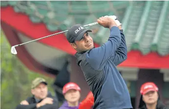  ??  ?? Shubhankar Sharma hits a shot at the Hong Kong Open.