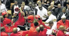  ?? ESA ALEXANDER ?? RIOTOUS ASSEMBLY: EFF members clash with parliament protection services at the Sona in Cape Town