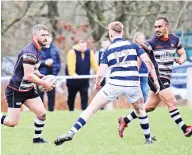  ?? Left, and Tommy PICTURE: Stuart Roebuck ?? Famous faces: Sean O’Loughlin, Leuluai playing for Wigan