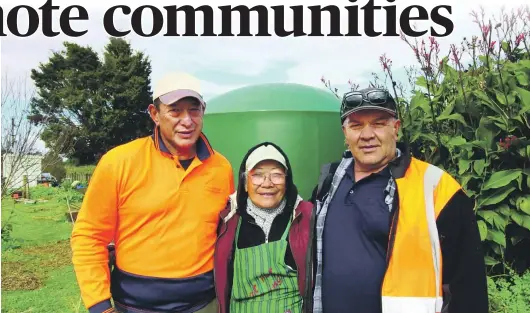  ?? NORTHLAND REGIONAL COUNCIL ?? Water resilience project leader Hone Dalton, left with Kaikohe’s Tina Broomfield and her new tank, and project operations manager Phil Young.