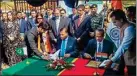  ?? PTI ?? Officials of India and Pakistan sign an agreement on the Kartarpur corridor at Zero Point near Dera Baba Nanak in Gurdaspur district, Thursday