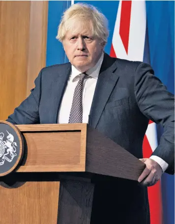  ?? ?? Boris Johnson, the Prime Minister, announces the new Covid rules during a press conference at Downing Street, yesterday