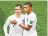  ?? STANISLAV KRASILNIKO­V/TASS ?? France’s Antoine Griezmann, left, and Kylian Mbappe will be looking to turn the tables on Thierry Henry in today’s semi.